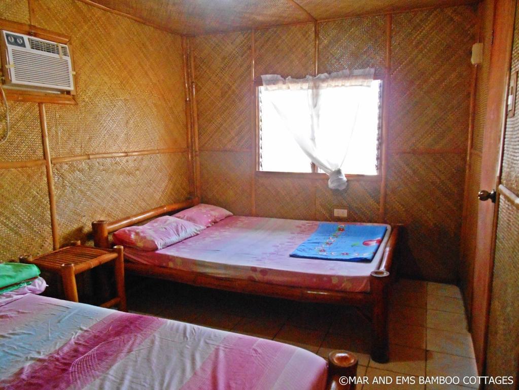 מלאפסקואה איילנד Pareja Tourist Inn חדר תמונה